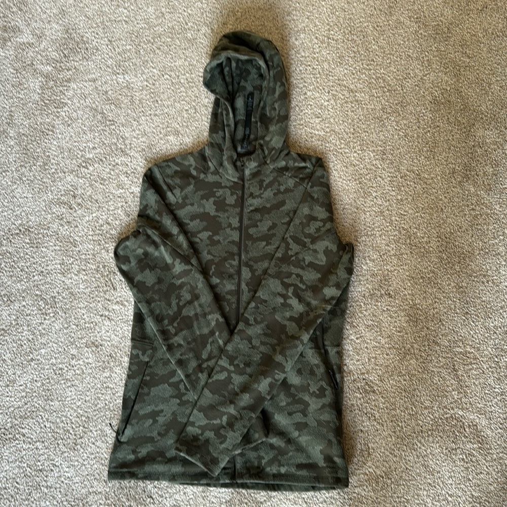 Lululemon jacket snug (I like)  Fits me perfect I’m 5’10 160.
